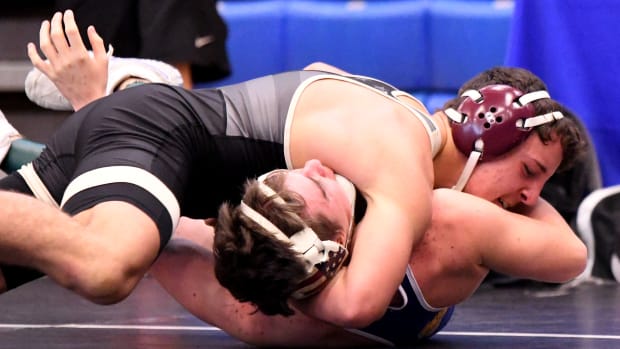 Lake Gibson’s Gianni Maldonado works his way to a pin over Nicholas Gjerde from Charlotte at the 0:54 mark during a 145-pound 2A semifinals match at the FHSAA Duals Wrestling State Championships this past season at Osceola High School in Kissimmee.